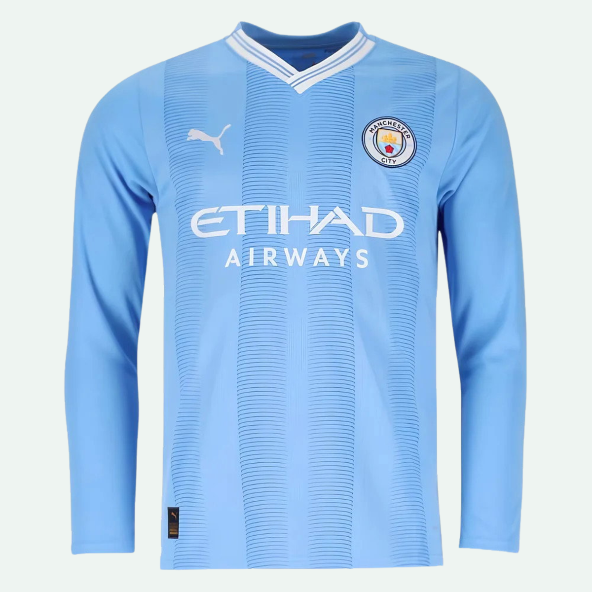 Manchester City 23/24 Home Long Sleeve Jersey product image 1, provided for visual reference and product detail review